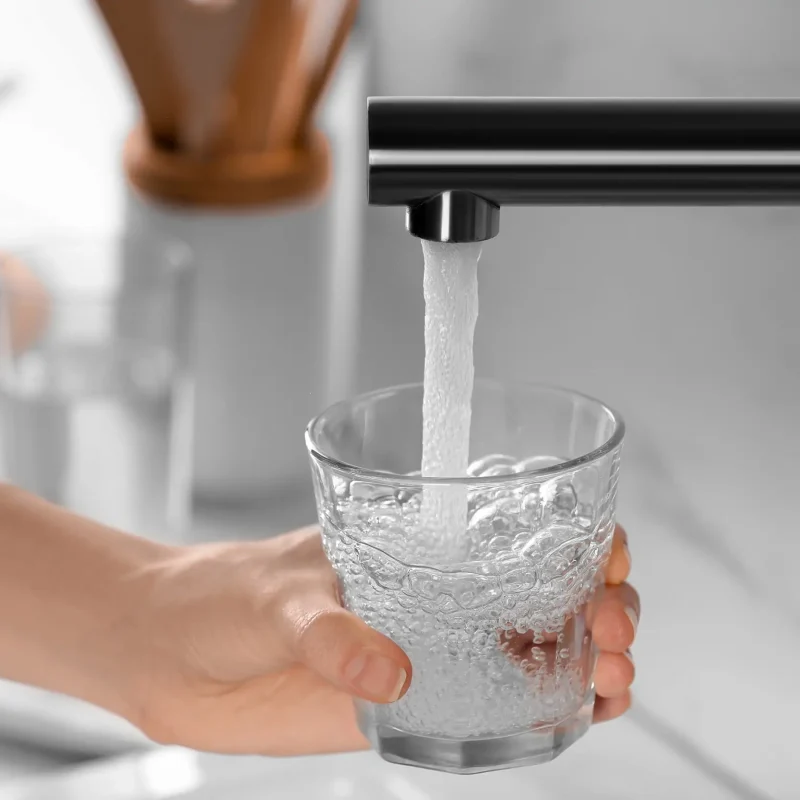 filling-glass-with-refreshing-water-from-faucet-2026-03-27-01-43-37-utc