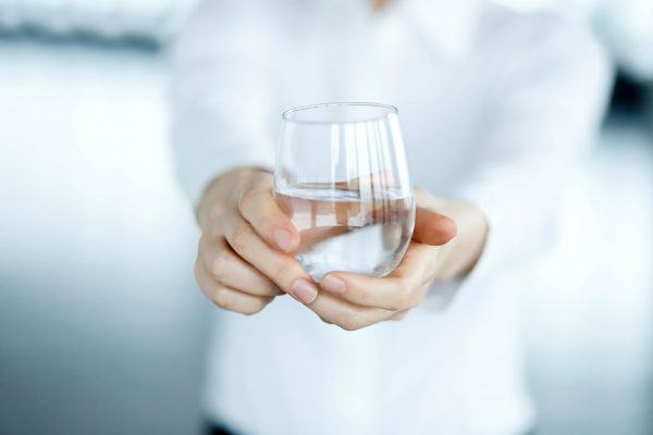 Holding glass of water Holding glass of water